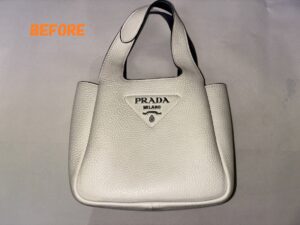カバン修理　PRADAプラダ　ハンドバッグ　白　汚れ　黄ばみ　クリーニング　染め直し
